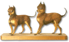 Taxidermy Black and Tan Terriers.